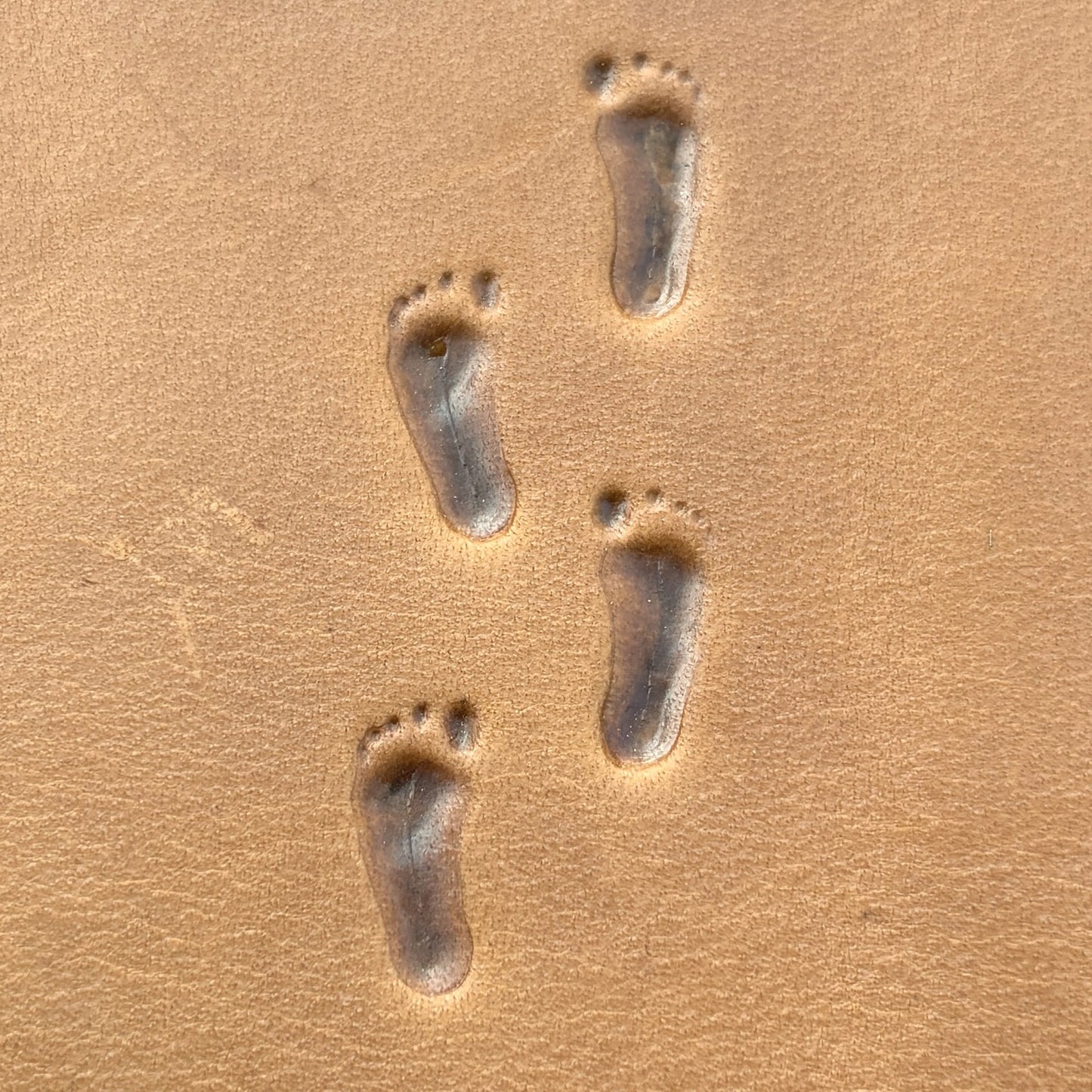 Bare Footprint leather stamp LT748 — pattern imprint on veg-tan leather