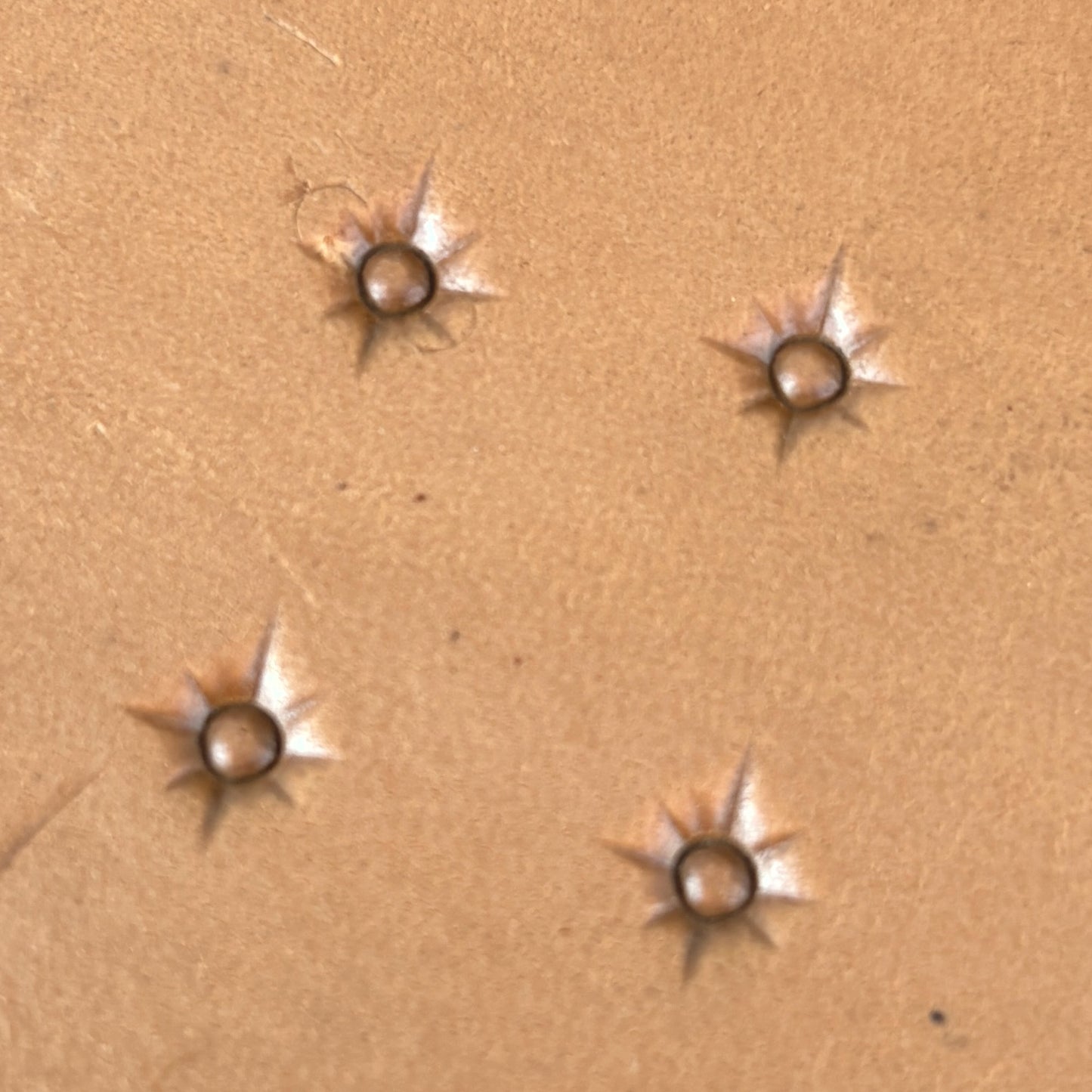 Starburst Geometric leather stamp LT749 — pattern imprint on veg-tan leather