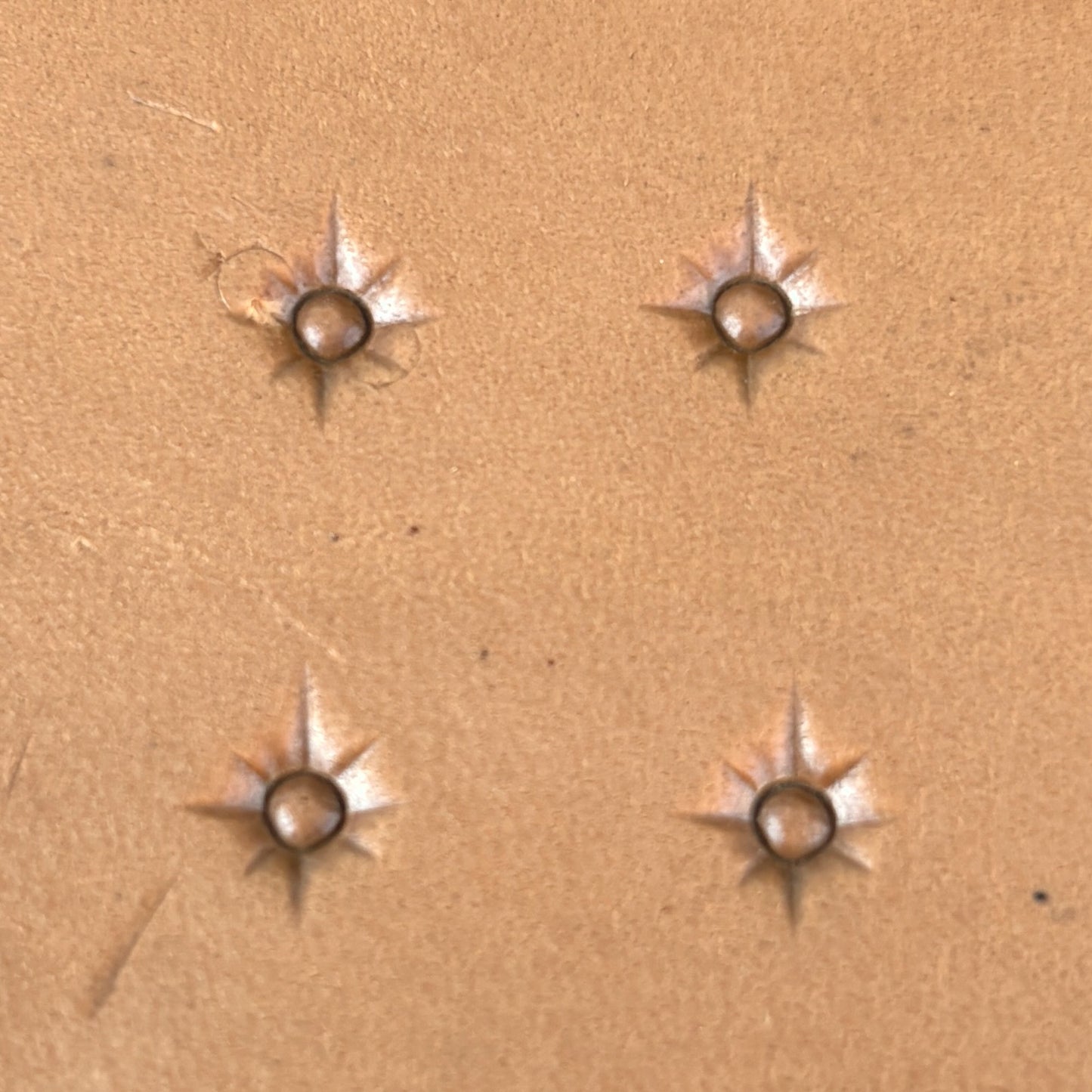 Starburst Geometric leather stamp LT749 — pattern imprint on veg-tan leather