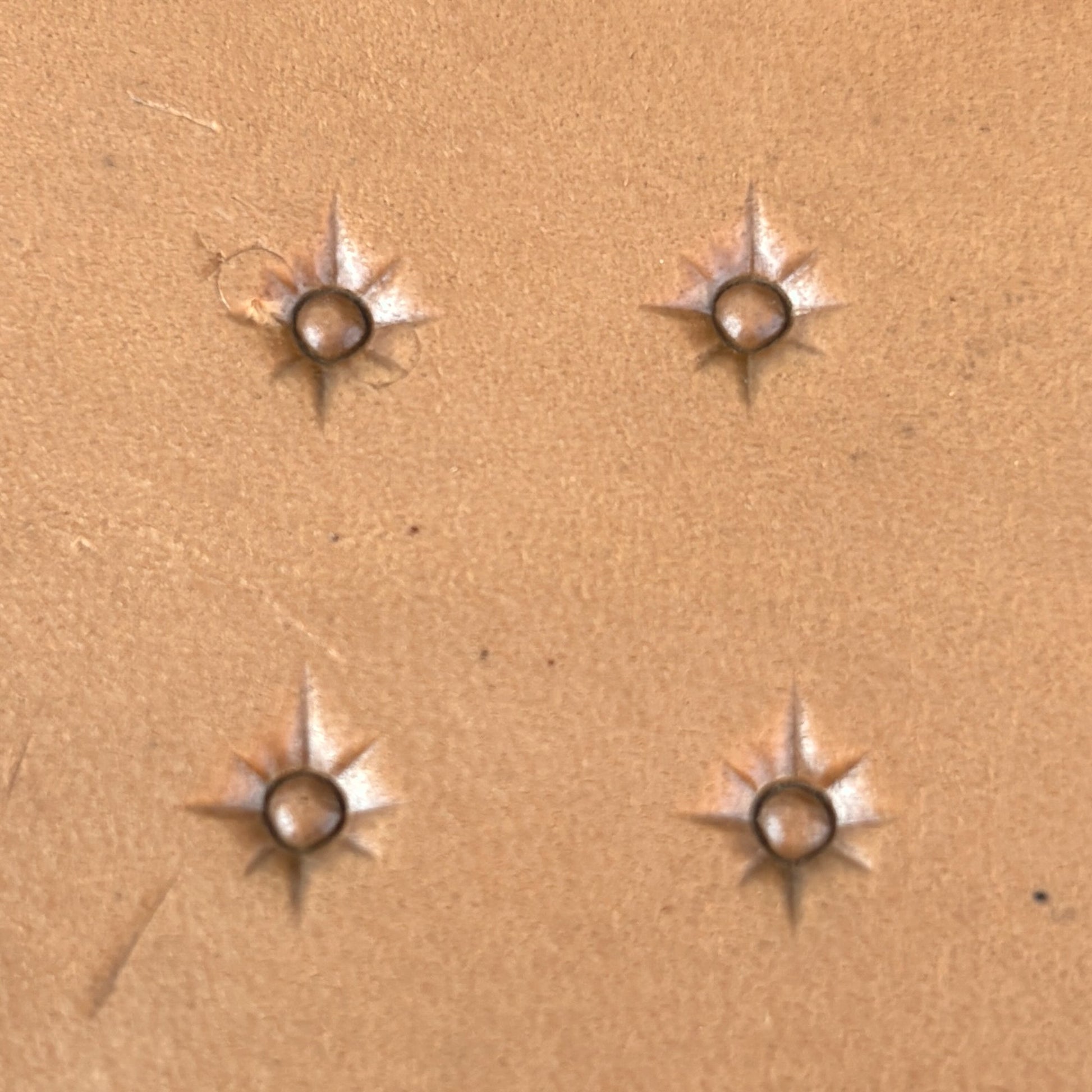 Starburst Geometric leather stamp LT749 — pattern imprint on veg-tan leather