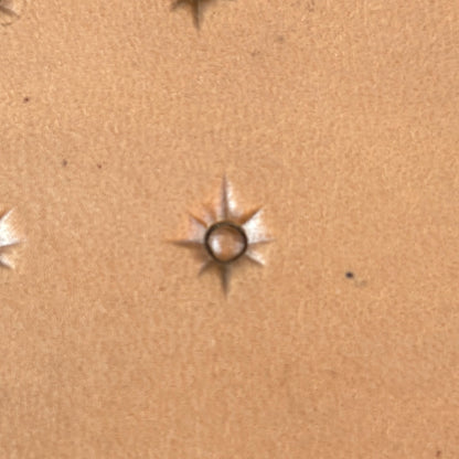 Starburst Geometric leather stamp LT749 — single impression on veg-tan leather