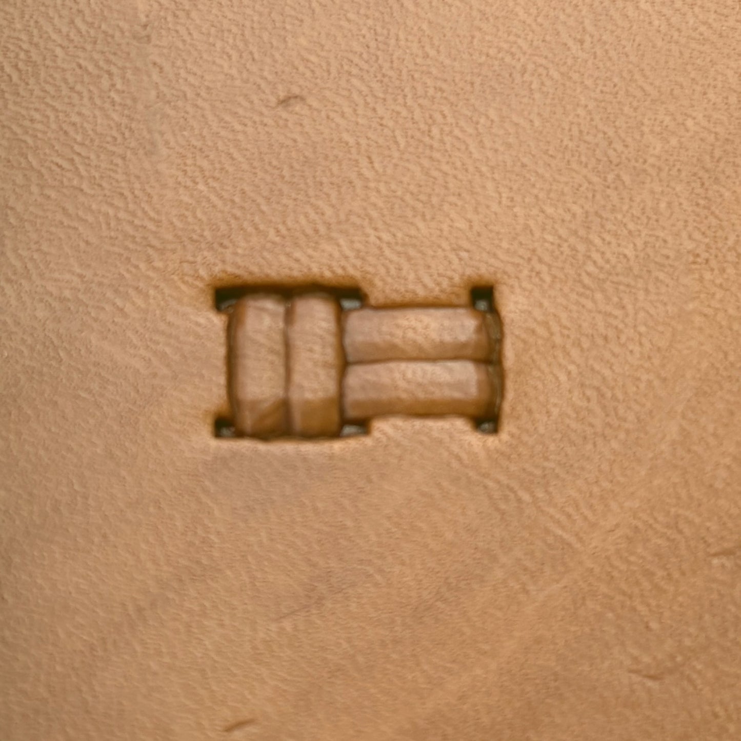 Basket Weave leather stamp LT781 — single impression on veg-tan leather