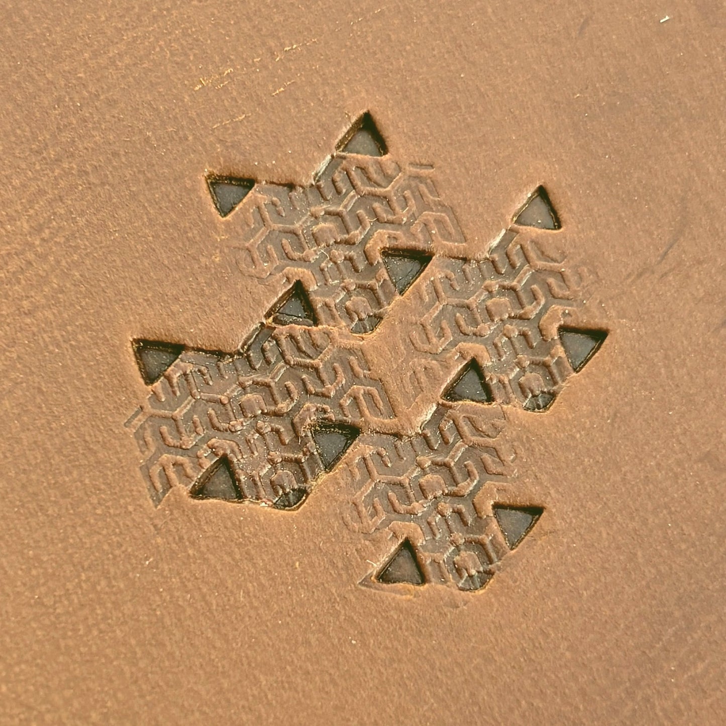 Hooked Mesh Hex Tile leather stamp LT823 — pattern imprint on veg-tan leather