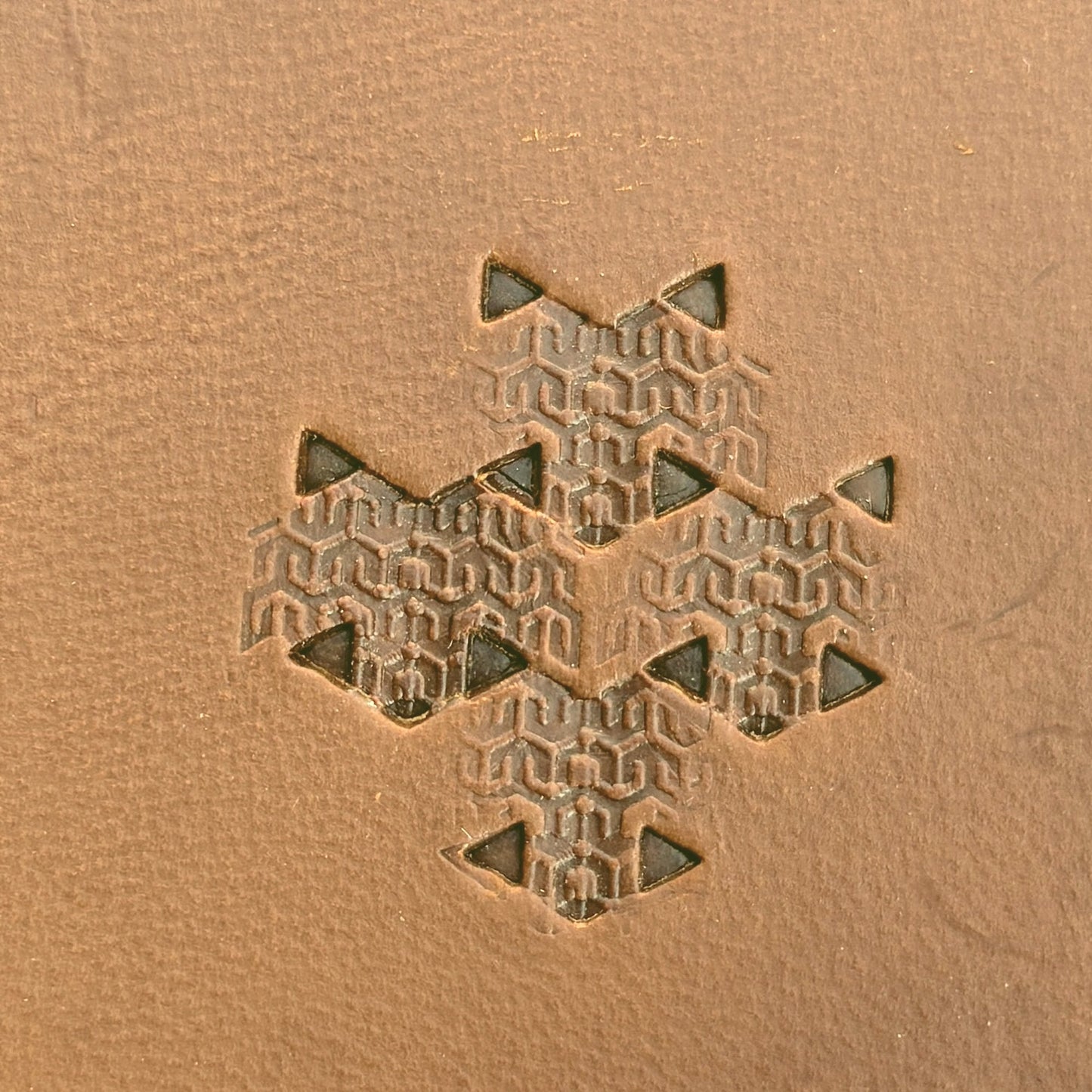Hooked Mesh Hex Tile leather stamp LT823 — pattern imprint on veg-tan leather