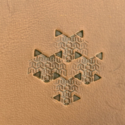 Hooked Mesh Hex Tile leather stamp LT823 — pattern imprint on veg-tan leather