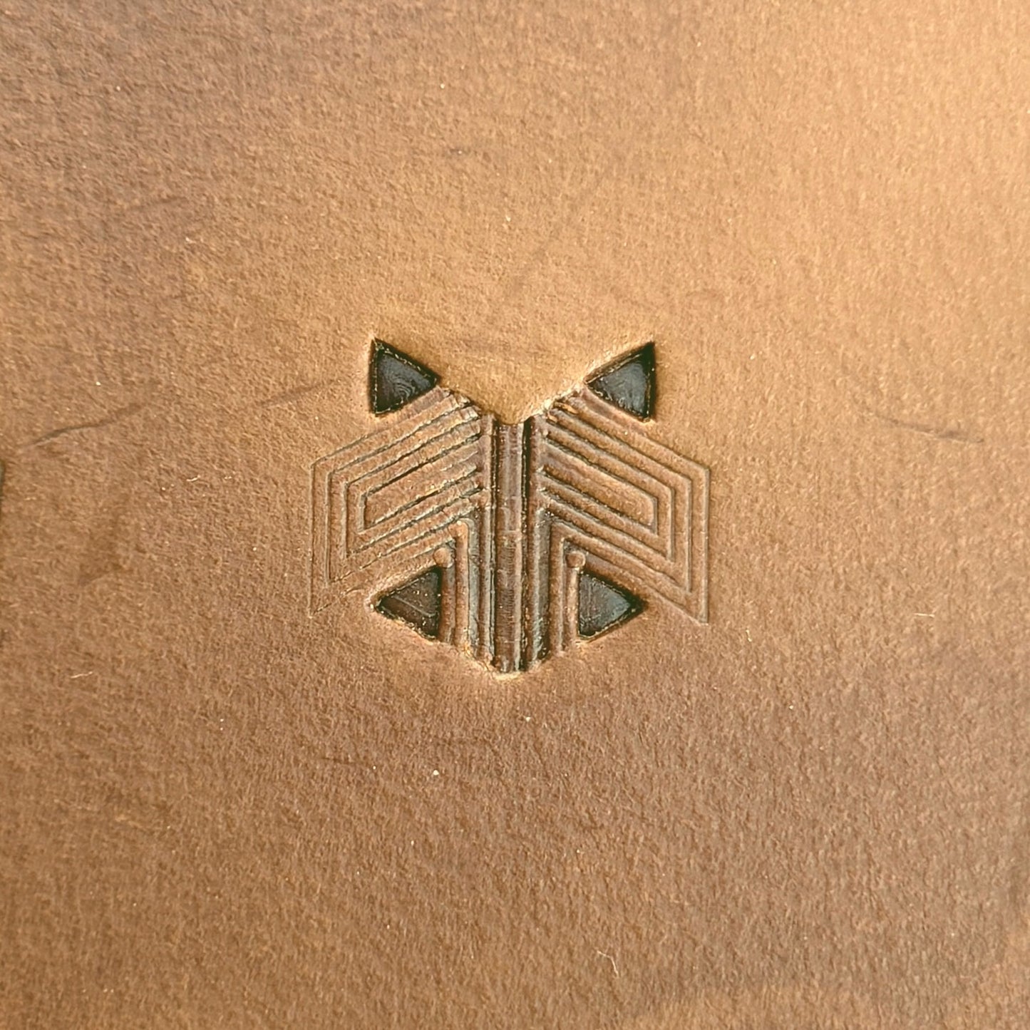 Geometric Lines leather stamp LT824 — single impression on veg-tan leather