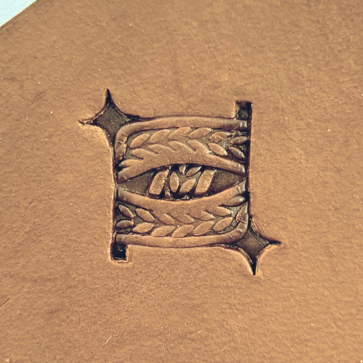 Braided Squares Basket Weave leather stamp LT825 — single impression on veg-tan leather