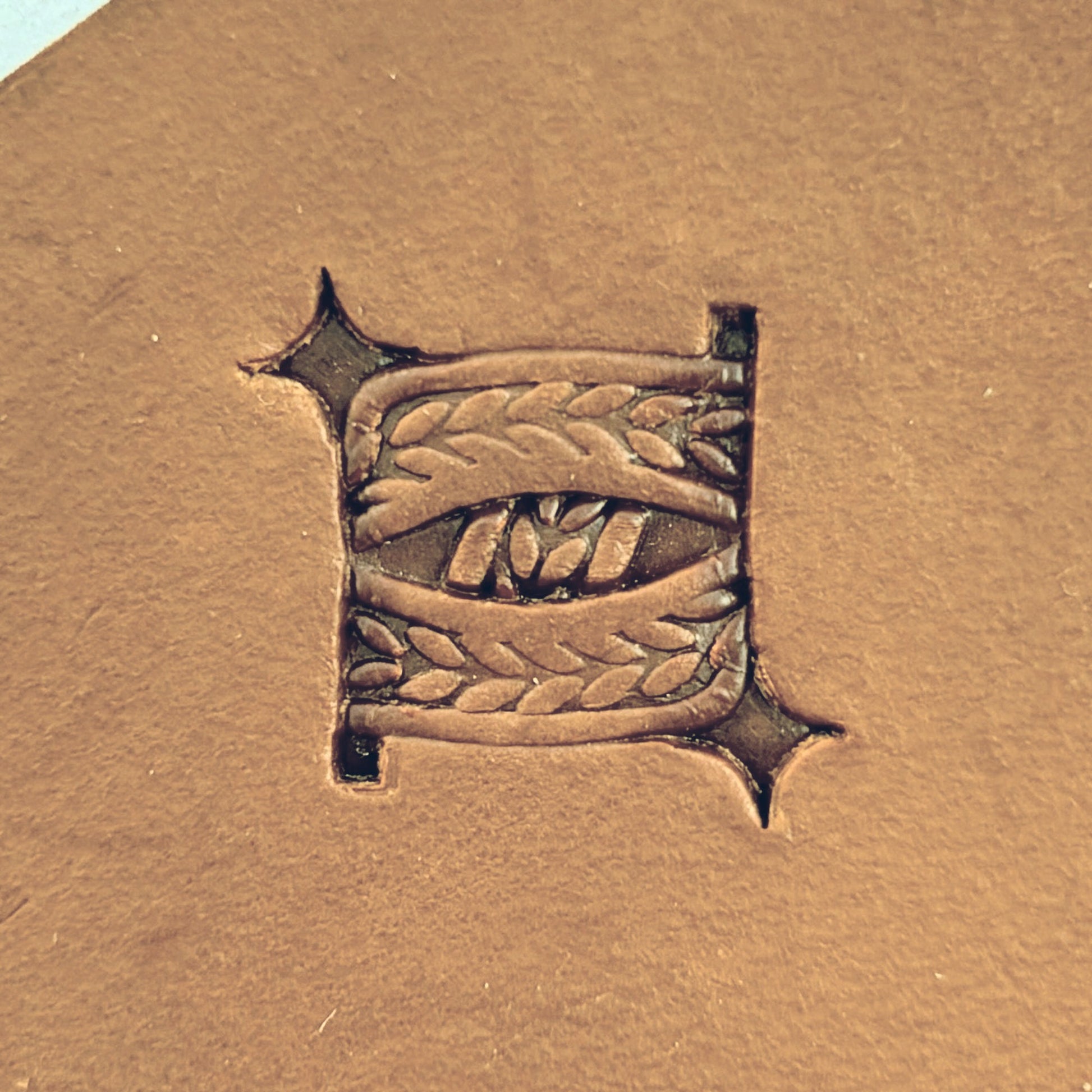 Braided Squares Basket Weave leather stamp LT825 — single impression on veg-tan leather