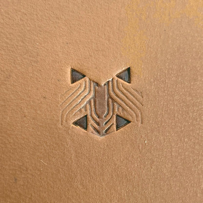 Grooved Hex Tile leather stamp LT826 — single impression on veg-tan leather