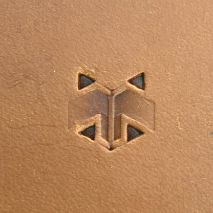 Smooth Hex Tile leather stamp LT827 — single impression on veg-tan leather