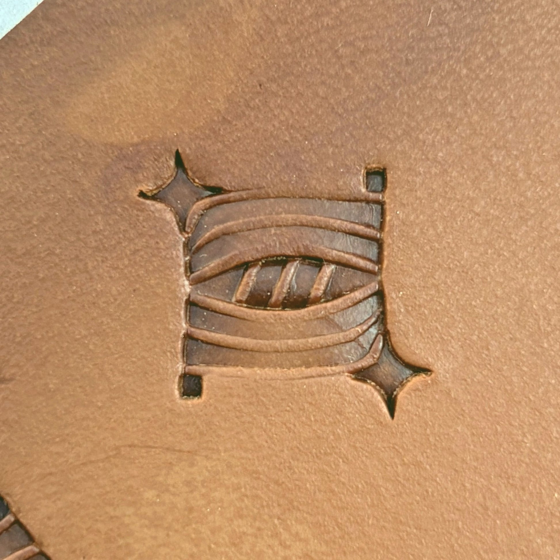 Diamond Lines Basket Weave leather stamp LT828 — single impression on veg-tan leather
