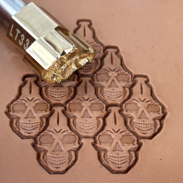 Large Interlocking Skull leather stamp LT835 — brass stamping tool with imprint on natural veg-tan leather