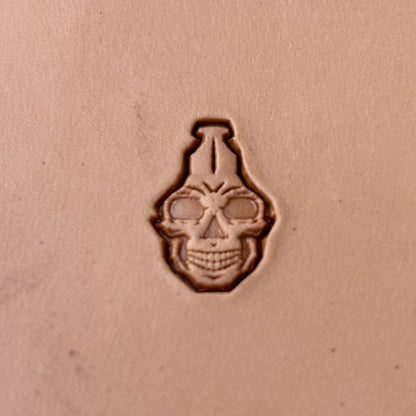 Interlocking Skulls leather stamp LT835 — single impression on veg-tan leather