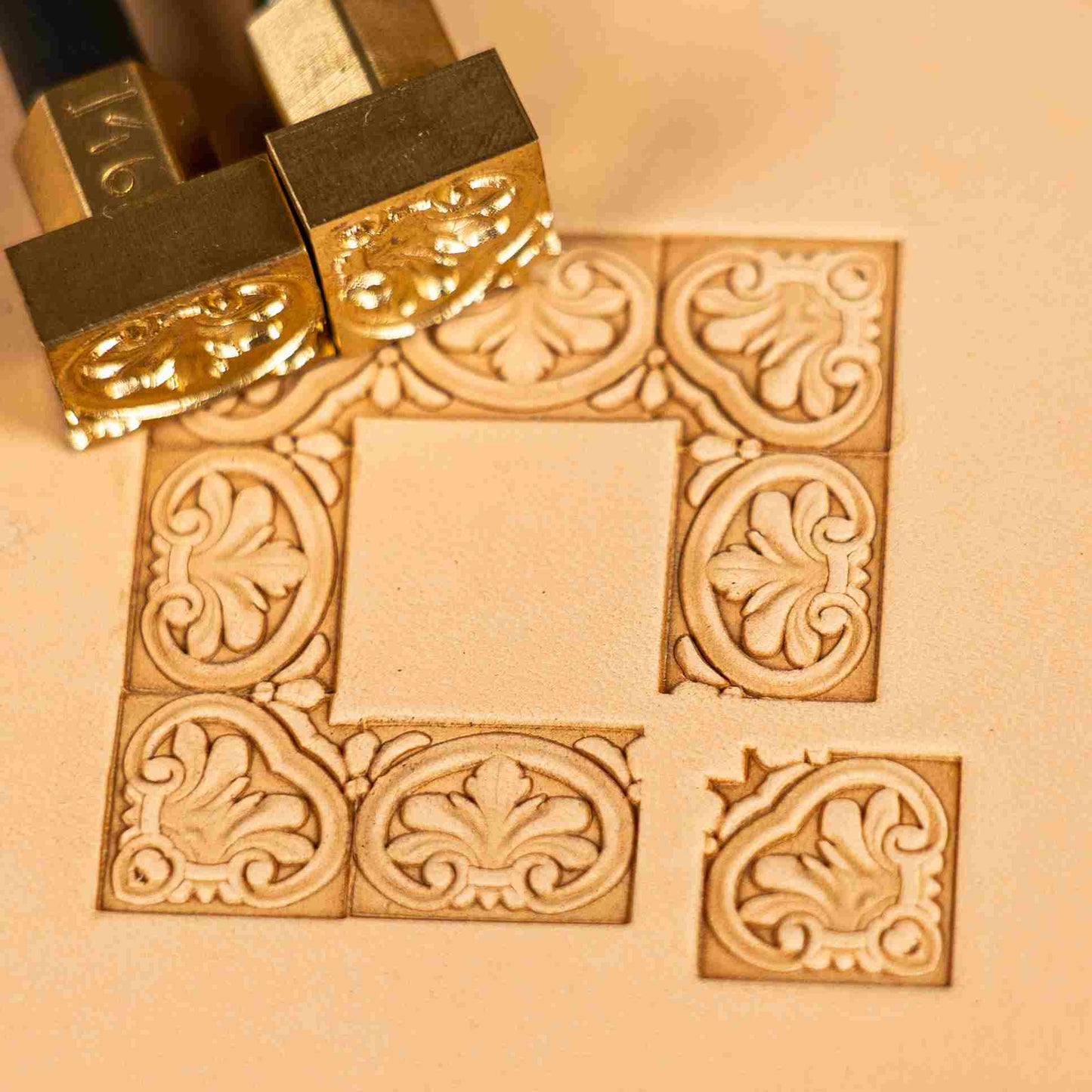 Ornate leather stamp LT146 — corner stamp impression on veg-tan leather