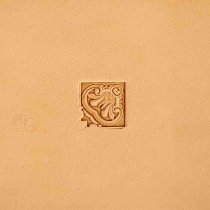 Ornate leather stamp LT146 — corner stamp impression on veg-tan leather